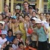 Volunteers with local children Matt Carson in VFV Vietnam